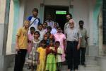 India, West Bengal, south of Chacalie town - With Fr. Anthony, two sisters, and parishioners at a Catholic mission that welcomed