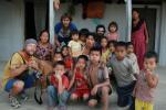 Nepal, Bengadawas-4 village - With our generous home stay hosts, surrounded by village children.