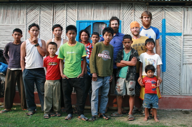 Nepal, Bhutanese Refugee Camp - With other neighbors on the side of their church.