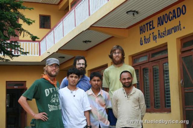 Nepal, Pokhara - With our friendly guesthouse staff. This was probably the best value in guesthouses we've found in Asia: 3 beds