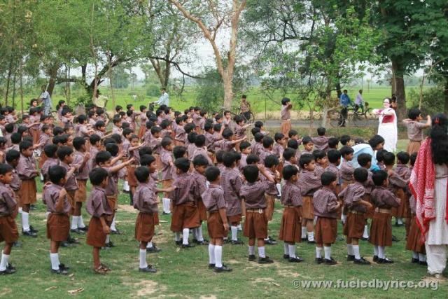 India, West Bengal, Katna village - Primary school students at Jagriti ["awakening"] Public School, with founderess, S