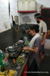 India, West Bengal, Katna village - Maria & Jim cooking in Brian & Maria's kitchen - such a nice change from rice and da