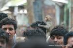India, West Bengal - A monkey in the crowd gathered around us!