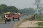 India, West Bengal - A back county road with typical rural Indian "mass-transit"