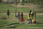 Nepal, east lowlands - A different lifestyle. Women & girls at the hand pump well. This is how most rural and small town peo