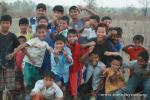 Nepal, east lowlands, Jamunibas village [homestay] - Youth at the soccer field. In their excitement, they pre-emptively ran towa