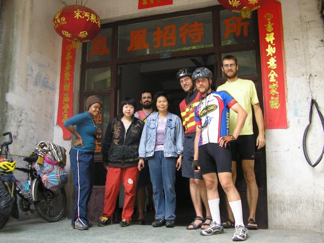 China, Anhui prov, Shi An, Oct 24 - In front of our Lu Guan (hostel) with the owners.