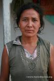 Nepal, east lowlands, Jamunibas village [homestay] - portraits. This woman's eyes remind me of a Tibetan woman we met in Gansu p