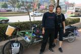 Korean fellow travelers - Kuang Sup & Su Ji - in Hunan, Changsha, China. They are also biking to Europe via SE Asia and Euro