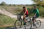 Hungary - women using bicycles as transport, something that is becoming more and more common for us to see in Europe.